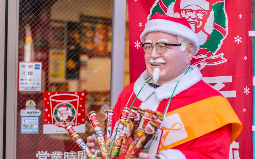 Japanese KFC at Christmas, with a Colonel Sanders statue dressed like Santa