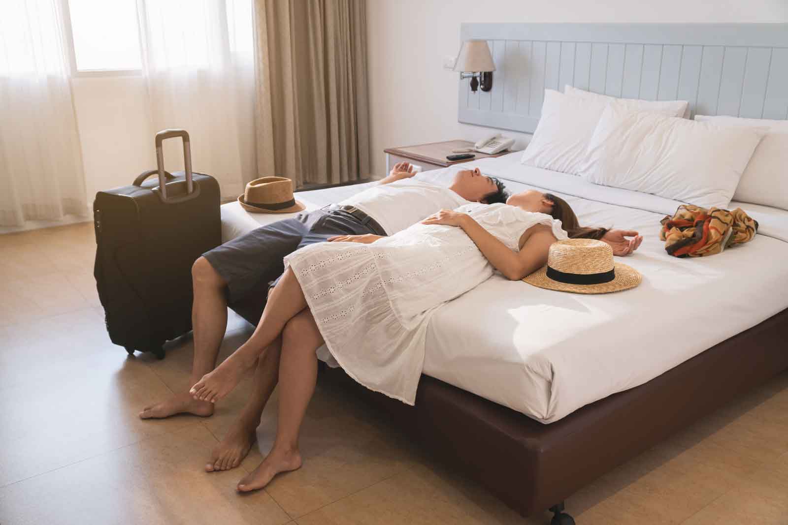 Couple resting in hotel room